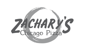 Logo for Zacharys Chicago Pizza. The text Zacharys is in bold, playful lettering, with Chicago Pizza below in a classic font. A circular brushstroke surrounds the text—perfect for showcasing on custom WordPress website designs.
