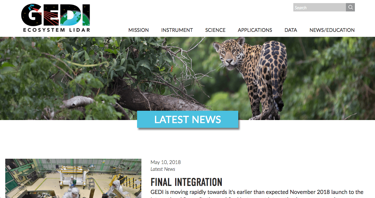 Screenshot of the GEDI Ecosystem Lidar website homepage, showing a jaguar in a green forest with a Latest News button, navigation menu, and a headline about final integration progress.