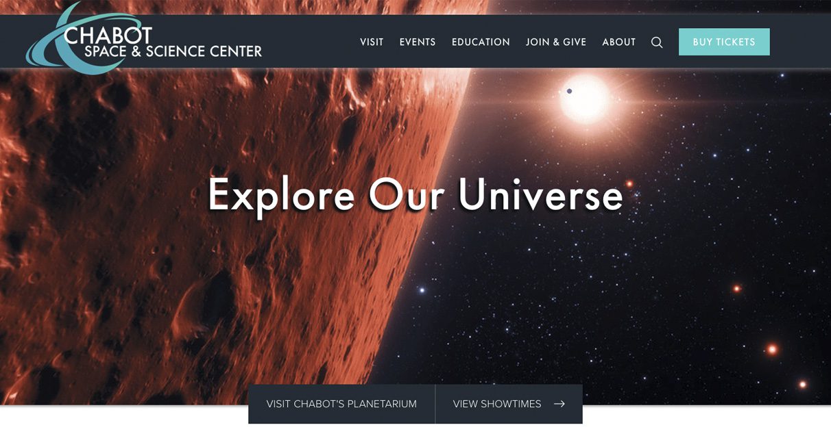 Screenshot of the Chabot Space & Science Center website homepage, featuring a space scene with a planet and star, and the text “Explore Our Universe” in large white letters. Navigation menu and buttons are visible at the top.