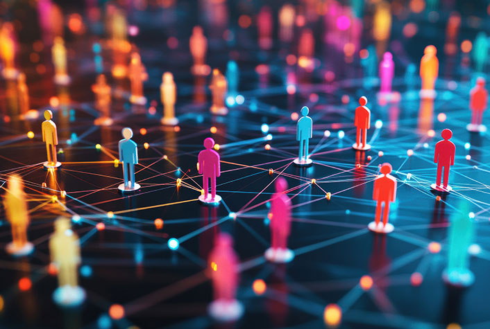 Colorful human-shaped figures stand on a network of interconnected glowing lines and nodes, symbolizing social networks, connections, or digital communication in a modern, abstract style.